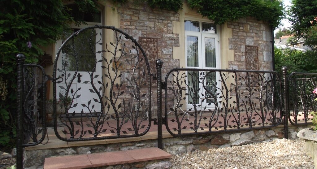 Stunning railings and gates with hand forged leaves